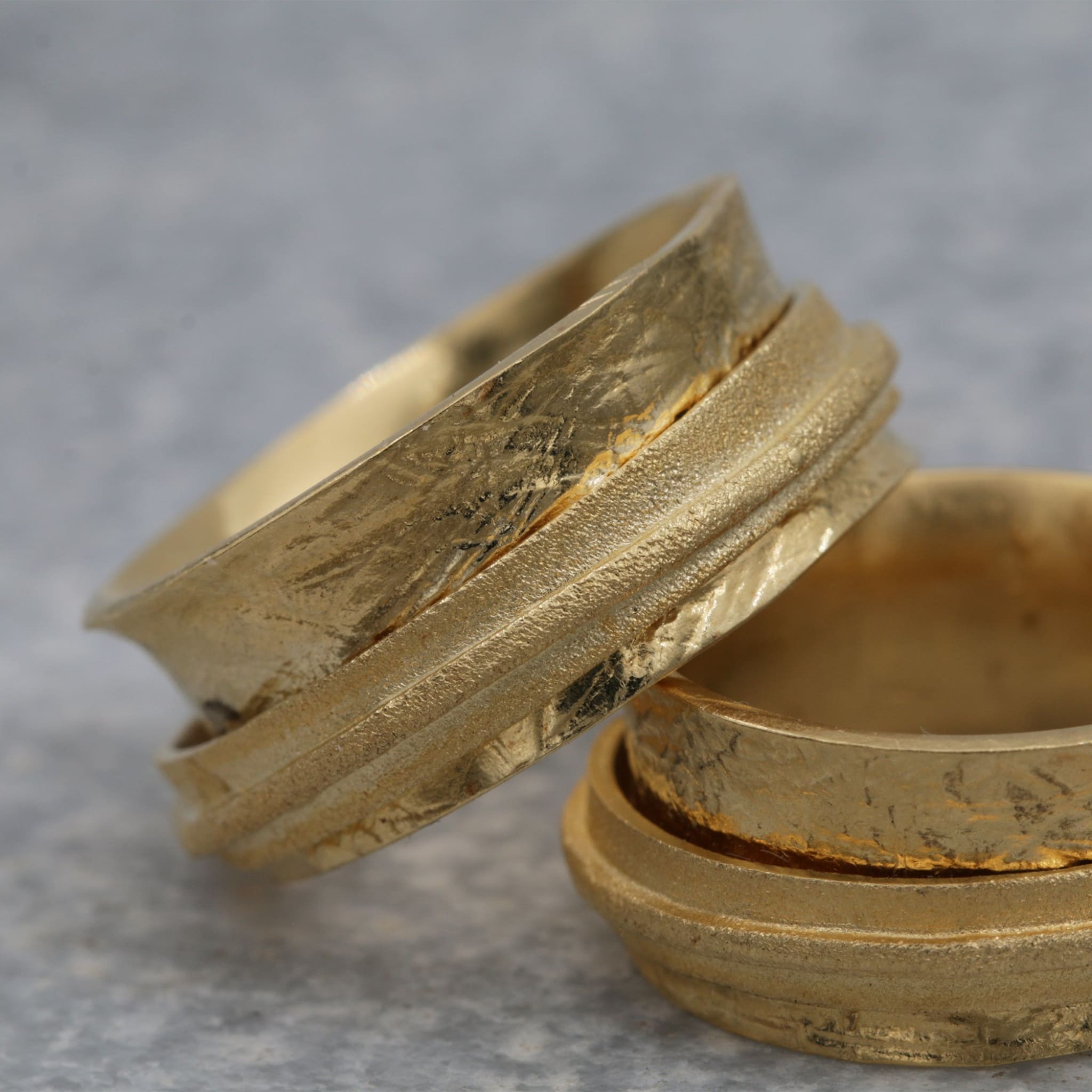 handcrafted 14k gold spinner rings 212